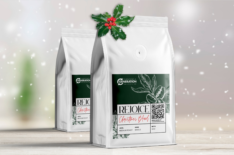 Coffee bag labeled 'Rejoice' with the Changing a Generation logo on a light gray background